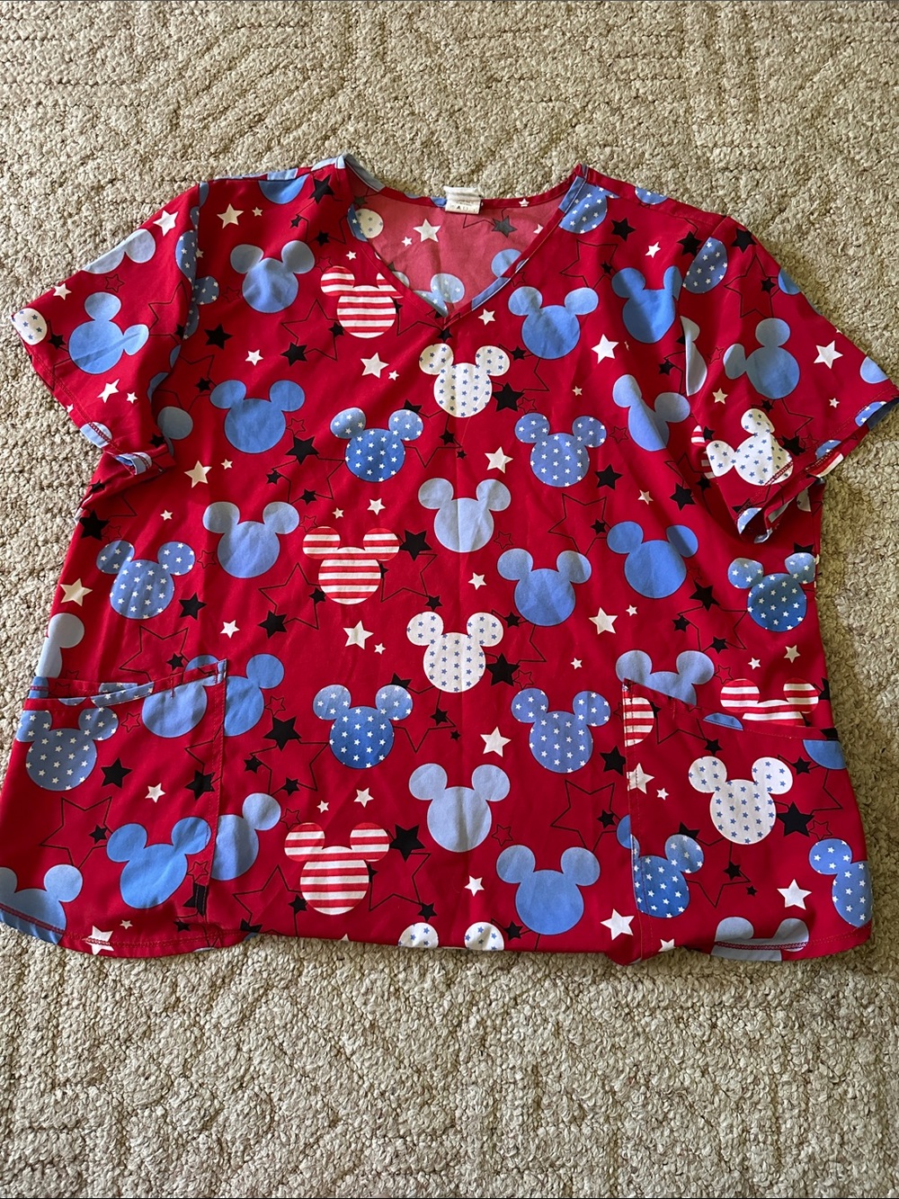 Disney Women's Red V-Neck Scrub Top with Blue and White Mickey Heads
